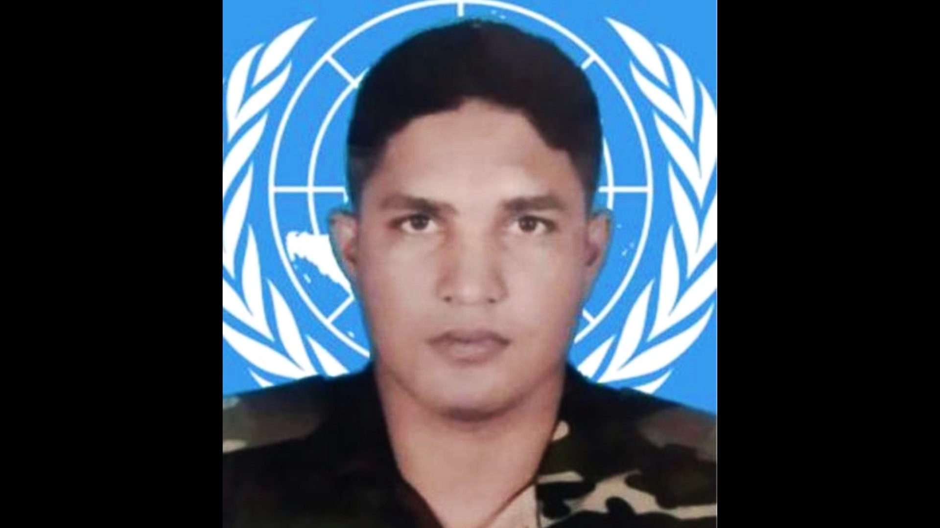 শান্তিরক্ষী শরিফের ছবি আঁকড়ে স্তব্ধ হয়ে আছেন স্ত্রী