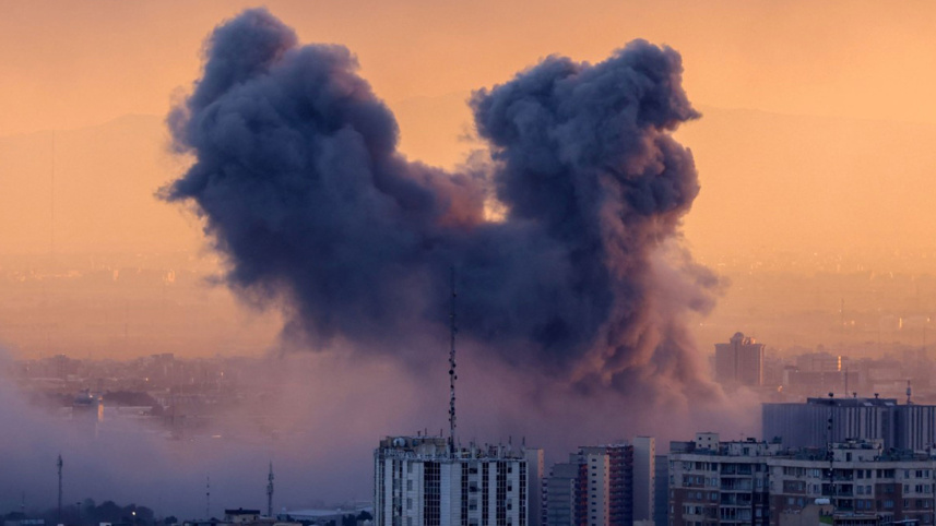 A plume of smoke rises after a strike on the Iranian capital Tehran, on March 3, 2026.