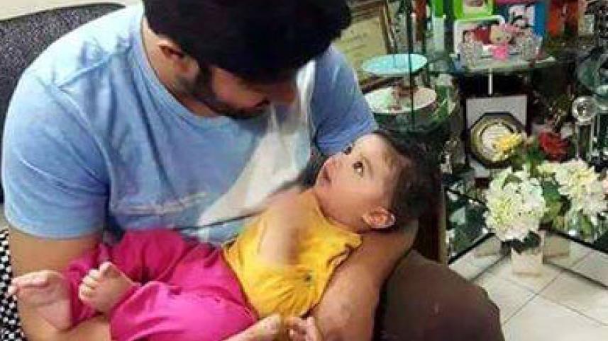 Shakib with son