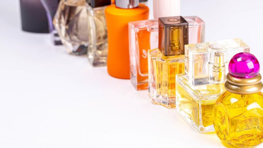 glass-bottles-with-different-perfumes-on-a-white-background.jpeg
