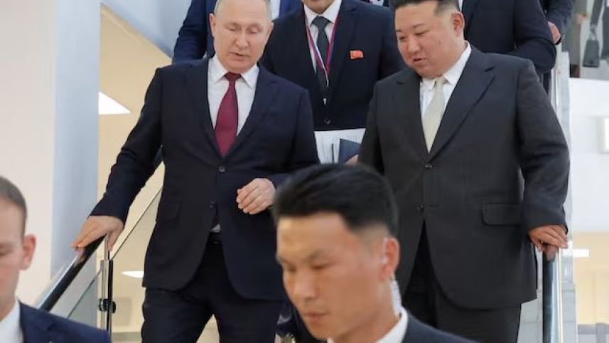 রুশ নেতা ভ্লাদিমির পুতিন ও উত্তর কোরিয়ার নেতা কিম জং উন। ফাইল ছবি: ডয়চে ভেলে 