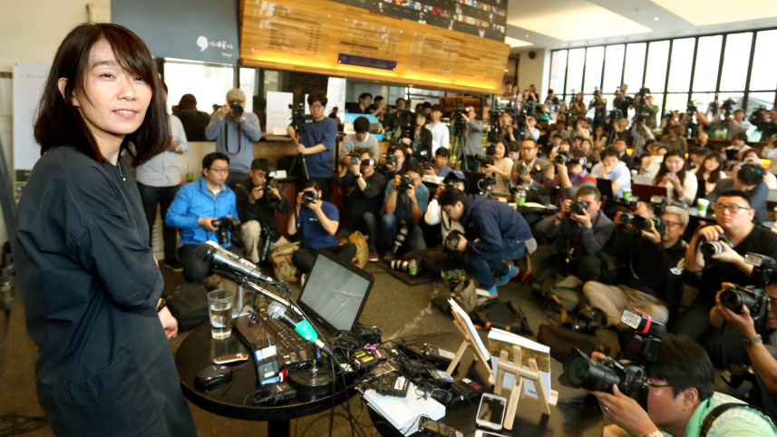 সংবাদ সম্মেলনে হান কাং। ফাইল ছবি: রয়টার্স