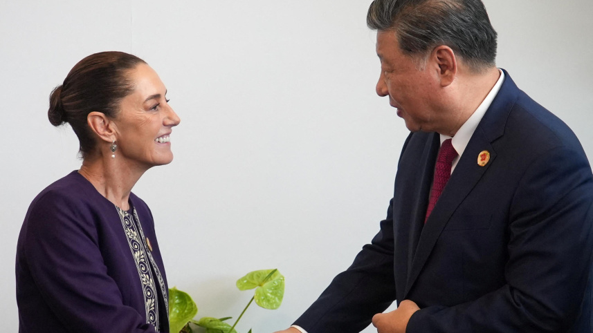 জি২০ সম্মেলনে মেক্সিকোর ক্লদিয়া শেনবম ও চীনের শি জিনপিং। ফাইল ছবি: রয়টার্স