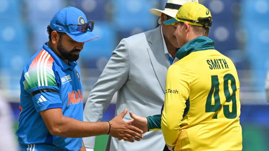India's captain Rohit Sharma (L) shakes hands with his Australian counterpart Steve Smith