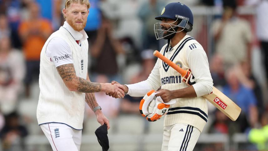 England's captain Ben Stokes (L) shakes hands with India's Ravindra Jadeja (R) for a draw on day five of the fourth cricket test match between England and India at Old Trafford, in Manchester, north England