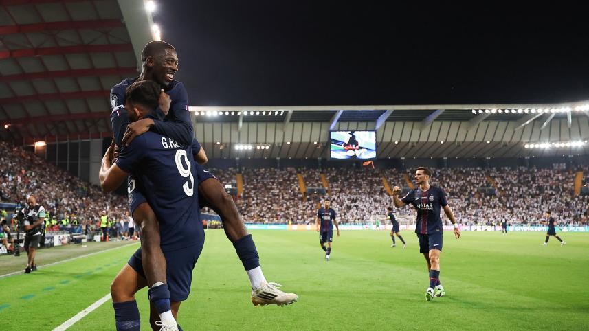 Paris Saint-Germain's Portuguese forward #09 Goncalo Ramos (2L) celebrates with Paris Saint-Germain's French forward #10 Ousmane Dembele 
