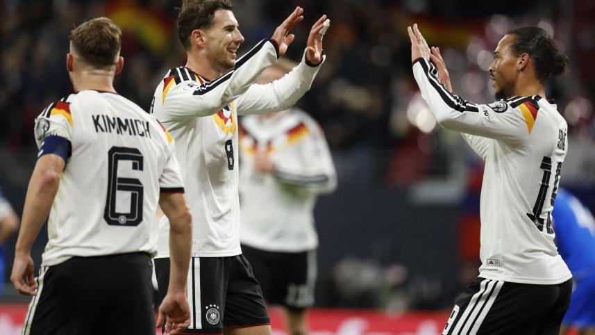 Germany's midfielder #19 Leroy Sane (R) celebrates with Germany's midfielder #08 Leon Goretzka
