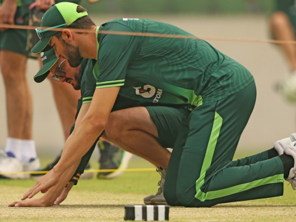 Pakistan captain Shaheen Afridi and coach Mike Hesson having a close look at the Mirpur pitch. Photo: Firoz Ahmed