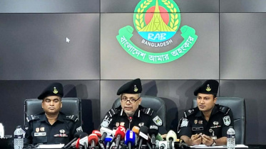 সংবাদ সম্মেলনে বক্তব্য রাখেন র‍্যাব ১০–এর অধিনায়ক অতিরিক্ত ডিআইজি মোহা. আসাদুজ্জামান। ছবি: সংগৃহীত
