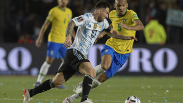 messi_and_fabinho.jpg