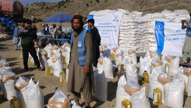 জাতিসংঘের খাদ্য ও কৃষি সংস্থা আফগানিস্তানে ত্রাণ বিতরণ করছে