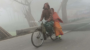 কনকনে ঠান্ডায় নিম্ন আয়ের মানুষের দুর্ভোগ