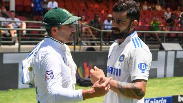 south_africas_dean_elgar_l_and_indias_virat_kohli_r.jpg