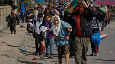 ইসরায়েলি আগ্রাসনের মুখে উত্তর গাজা ছেড়ে পালিয়ে যাচ্ছেন হাজারো ফিলিস্তিনি। ব্রেকিং নিউজ ফটোগ্রাফিতে পুলিৎজার পুরষ্কার পেয়েছে রয়টার্সের এই ছবিটি। ফাইল ছবি: রয়টার্স