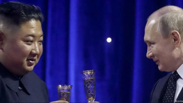 রুশ নেতা ভ্লাদিমির পুতিন ও উত্তর কোরিয়ার নেতা কিম জং উন। ফাইল ছবি: ডয়চে ভেলে 