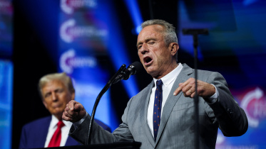 ট্রাম্প ও কেনেডি জুনিয়র। ফাইল ছবি: রয়টার্স