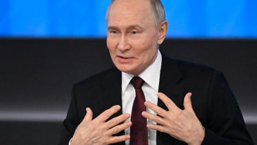 বছর শেষের সংবাদ সম্মেলনে ভ্লাদিমির পুতিন। ছবি: এএফপি