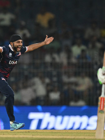 USA's Harmeet Singh (L) celebrates