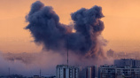 A plume of smoke rises after a strike on the Iranian capital Tehran, on March 3, 2026.